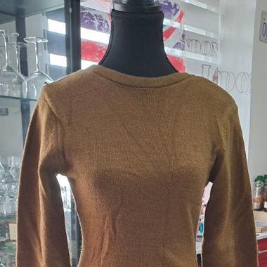 Maglione con schiena scoperta