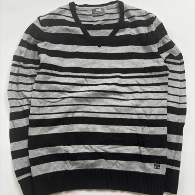 Maglione a scollo a V a righe