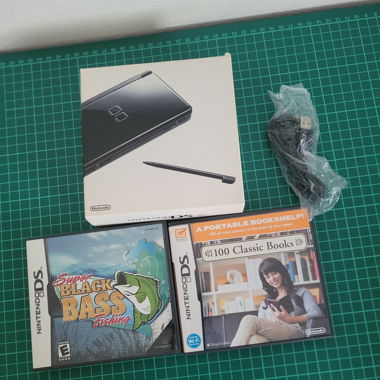 Nintendo DS Lite noire plus 2 jeux [dans OVP]
