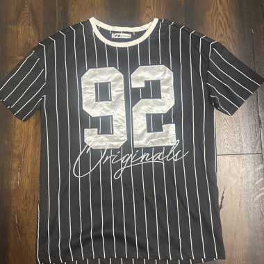 T-shirt in jersey nero a righe