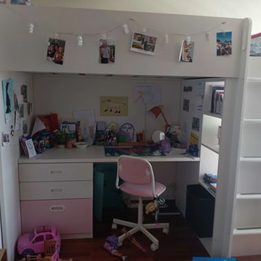 Pink children's loft bed