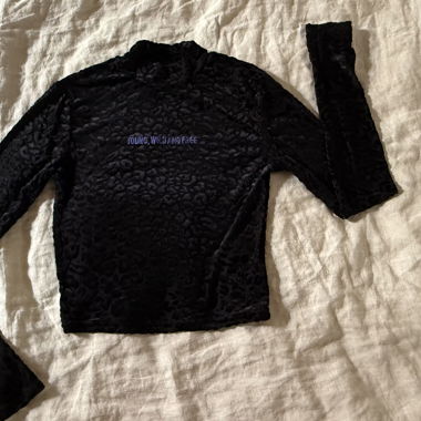 Top in mesh con stampa leopardo nera