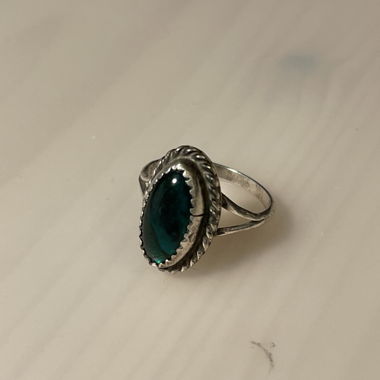 Silver ring with green stone