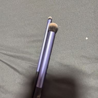 Purple makeup brushes