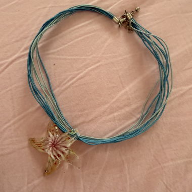 Glass necklace with starfish pendant