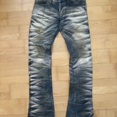 Jeans a zampa con effetto distressed Tornado Mart