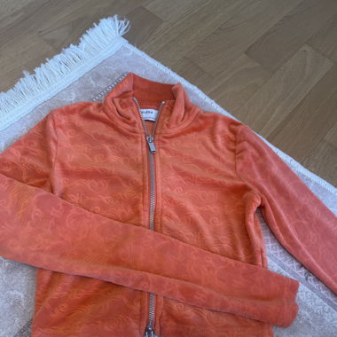 Orange zip up top 