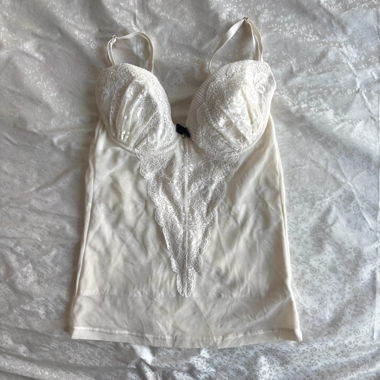 Top corset en résille avec bordure en dentelle “Merla”