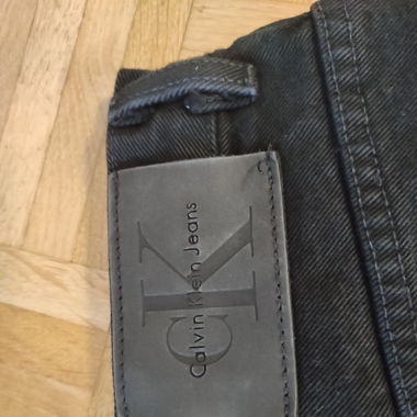 Jean homme noir, Calvin Klein, bon état, taille 30