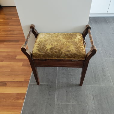 Upholstered ottoman with wooden frame