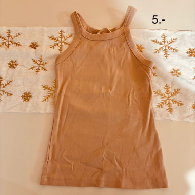 Top smanicato rosa nude
