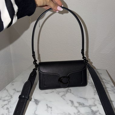 Schwarze Coach Umhängetasche