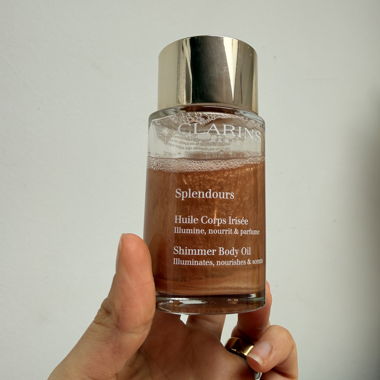 Huile corps scintillante Clarins