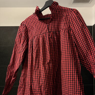 Black and red chequered blouse