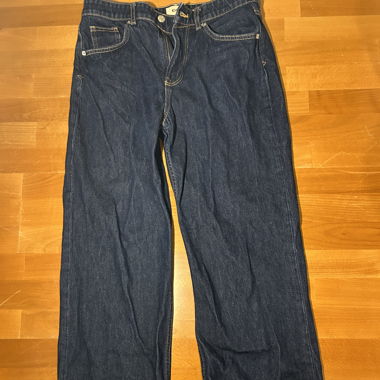 Jeans blu scuro con risvolto