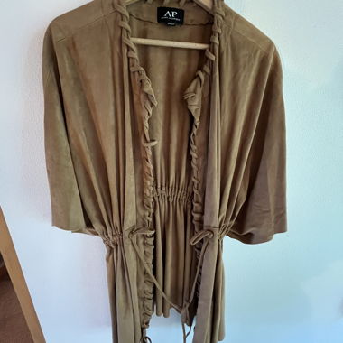 Beige little jacket with lacing