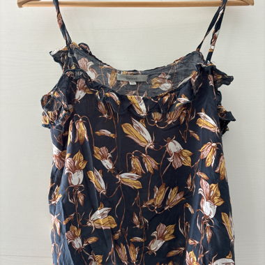 Top floreale con spalline regolabili