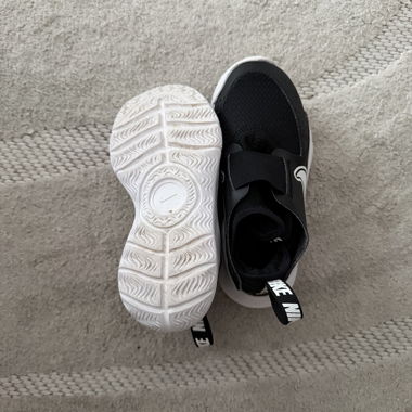 Nike schwarze Slip-on Sneaker
