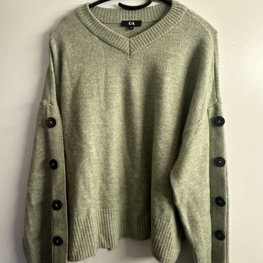 Hellgrüner Pullover