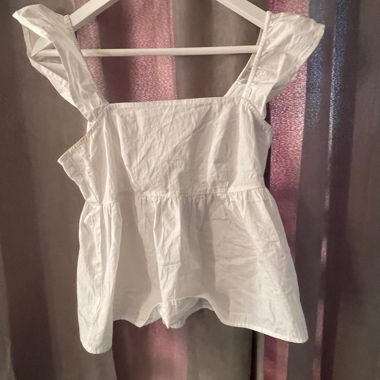 Top peplum bianco