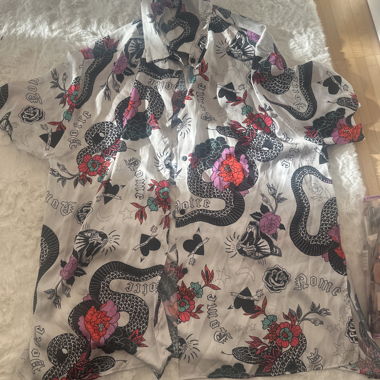 T-shirt stile leone-serpente