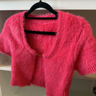 Cardigan en fausse fourrure rose