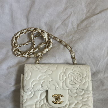 white Chanel flap bag