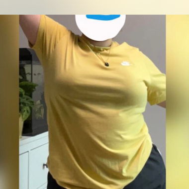 yellow Nike shirt