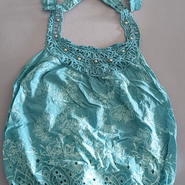 Top estivo turchese con pizzo