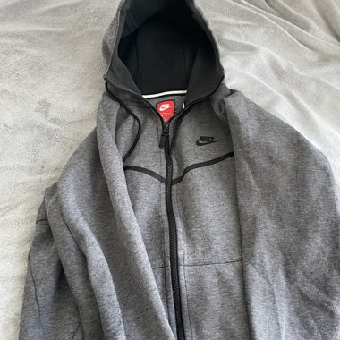 Grey zip-up Nike hoodie