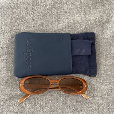 Occhiali da sole Le Specs ovali marroni