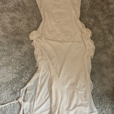 Abito color crema con rose