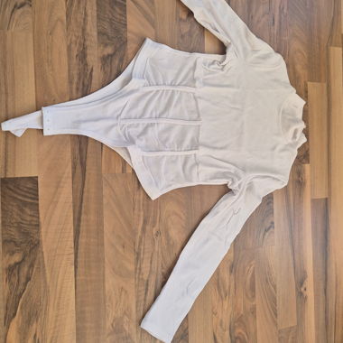 White long-sleeve bodysuit with transparent belly