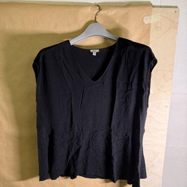 Blusa business nera senza maniche