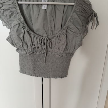 Blusa corta verde-grigia