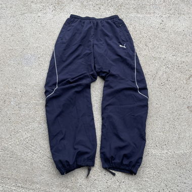 Pantaloni sportivi Puma blu scuro, taglio baggy, taglia M