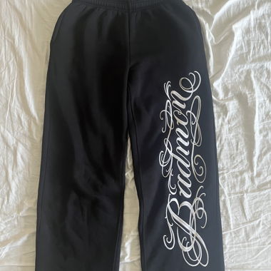 Pantaloni Badmon neri con scritta S