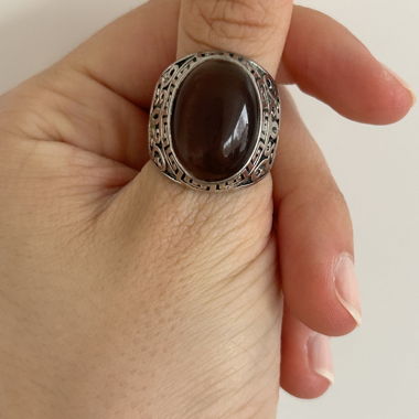 Silver ring with brown oval stone