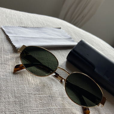 Lunettes de soleil ovales dorées