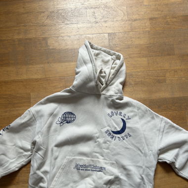 Off white hoodie with blue graphic