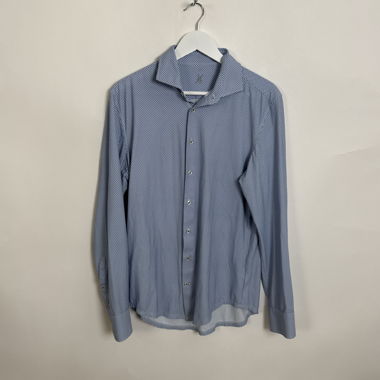 Chemise habillée bleue à motifs XB