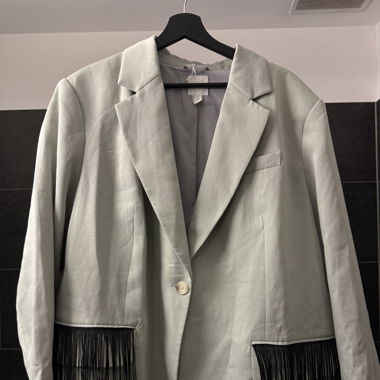 Mint green blazer with black fringes 