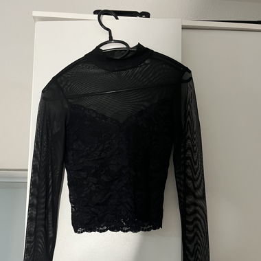 Schwarzes transparentes Oberteil
