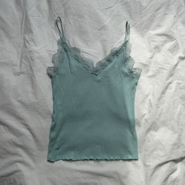 Top in pizzo turchese