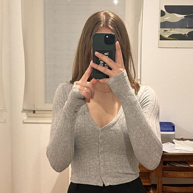 Grau meliertes Langarm-Pullover von H&M