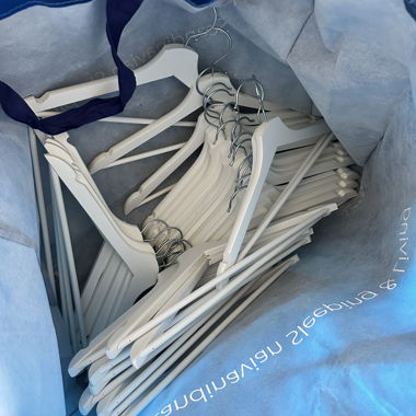 White wooden hangers