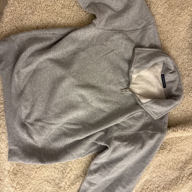 Grey quarter-zip sweatshirt