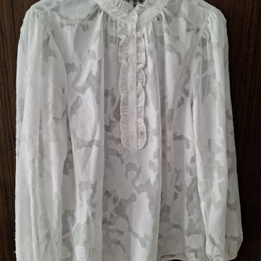 Blouse crème blanche transparente