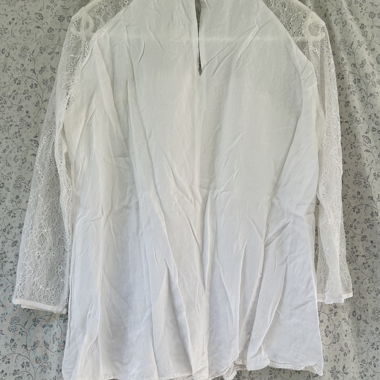 Blusa bianca in pizzo