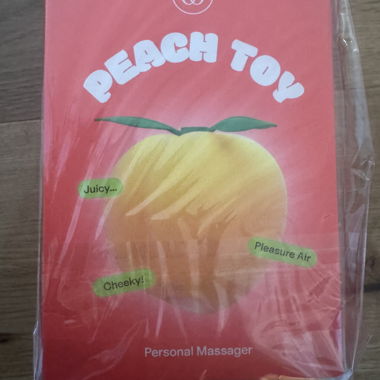 Womanizer Peach Toy Air Klitorisstimulator